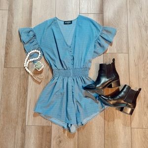Kittenish blue ruffle romper